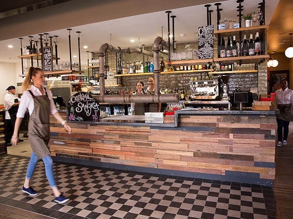 venue photograph of modern bar and bartender