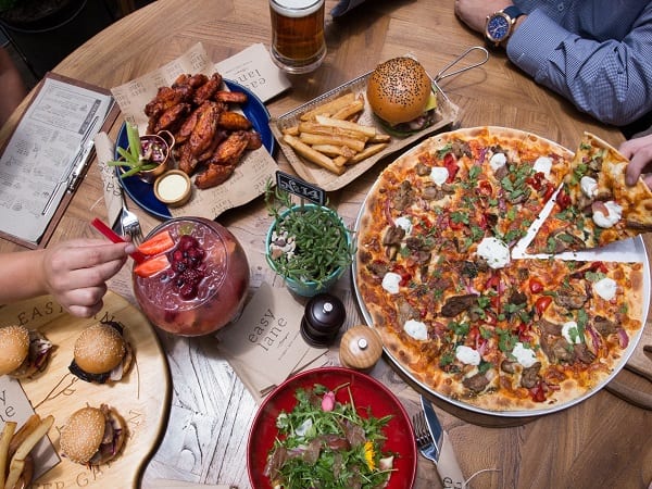 photograph of Easy Lane food of pizza and cocktails
