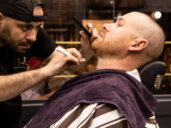 photo of Kingsmen Hair doing beard shave in Maitland