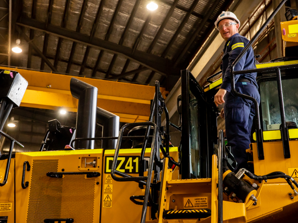 WesTrac D11 dozer and man at door at Bengalla Mine