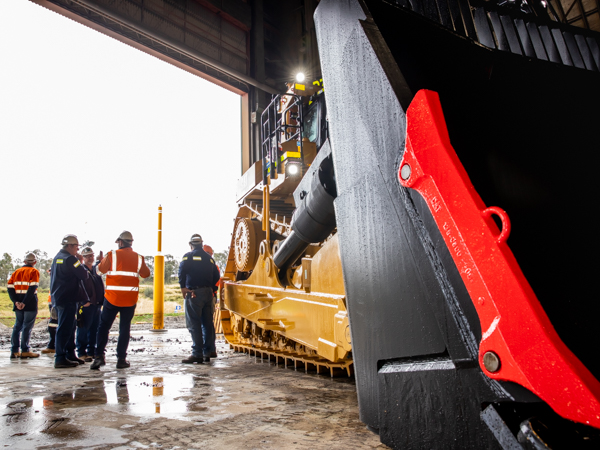 WesTrac D11 dozer and team chatting at Bengalla Mine