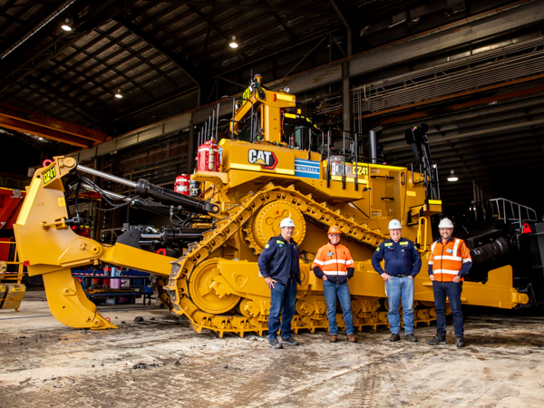 WesTrac D11 dozer and 4 men at Bengalla Mine